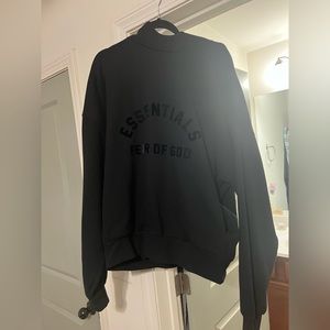 Essentials Goode size medium in black, fits like a large never been worn